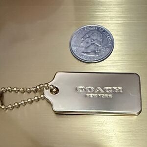 Coach Gold Tone Hang Tag